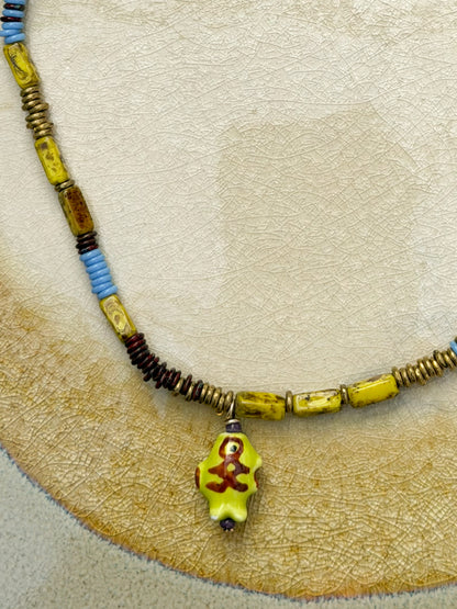 Rosario Necklace Dark Yellow Fish